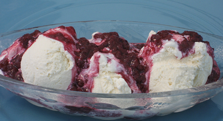 Ice cream with tayberry sauce